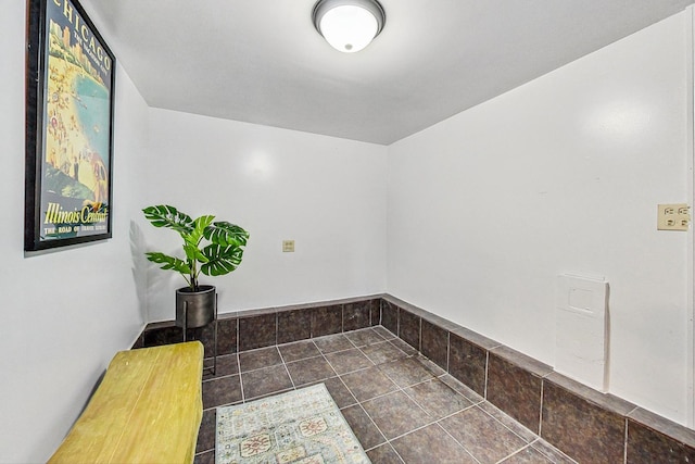 interior space with tile patterned floors