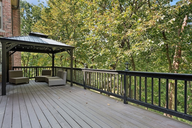 wooden terrace with a gazebo