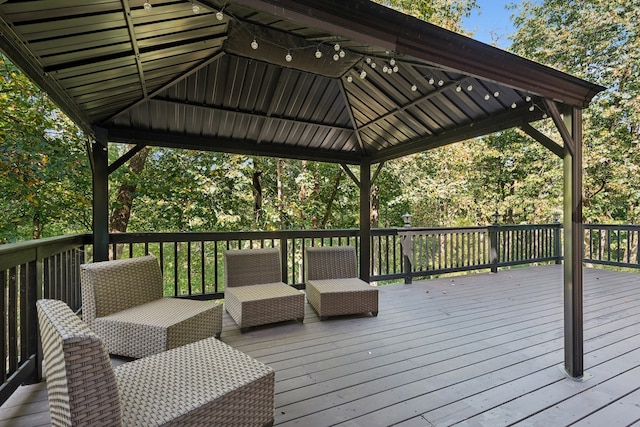 wooden terrace with a gazebo