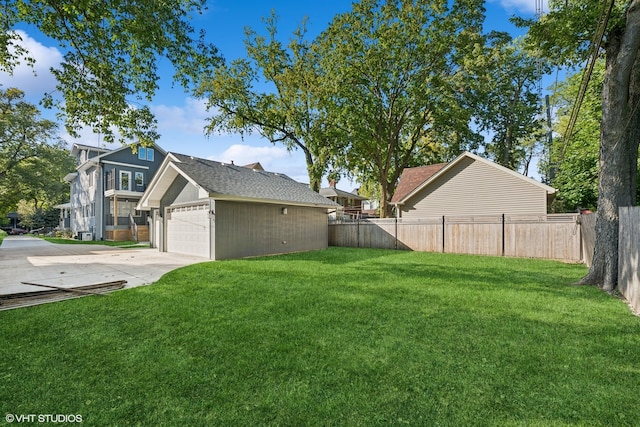 view of yard with a garage