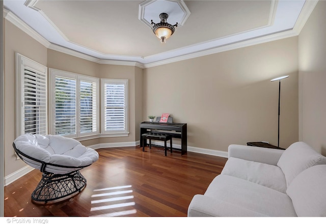 living room with ornamental molding and dark wood-type flooring