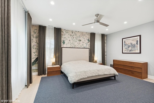 bedroom with recessed lighting, wallpapered walls, and ceiling fan