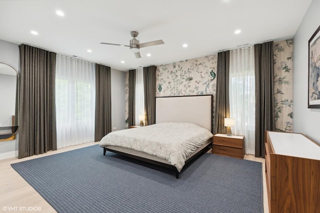 bedroom with recessed lighting, wallpapered walls, light wood-style floors, and ceiling fan