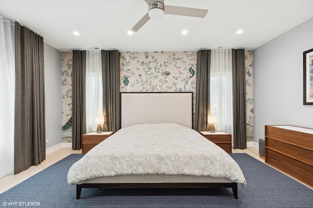 bedroom with recessed lighting, wallpapered walls, baseboards, and a ceiling fan