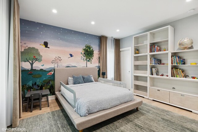 bedroom featuring light hardwood / wood-style flooring