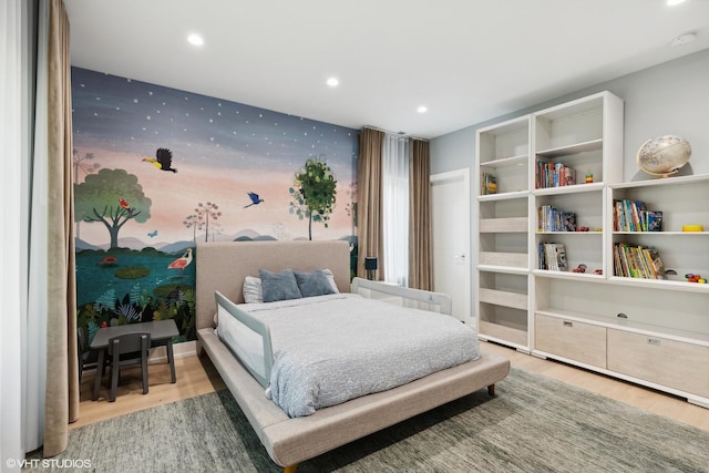 bedroom featuring recessed lighting, light wood-style flooring, and wallpapered walls