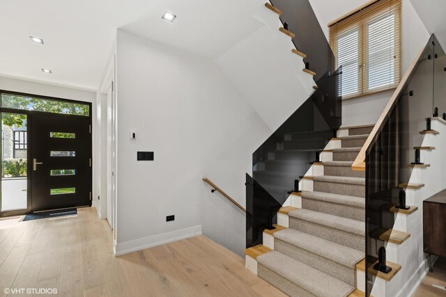 entryway with light hardwood / wood-style floors