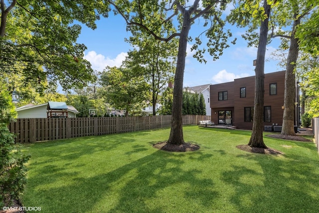 view of yard with a patio and fence
