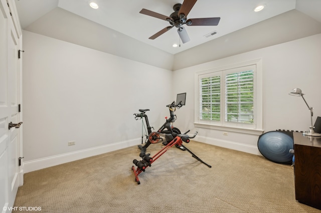 workout room with ceiling fan and carpet