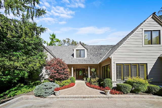 view of new england style home