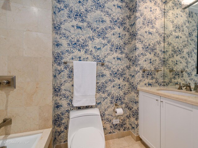 bathroom featuring vanity, toilet, and tile patterned floors