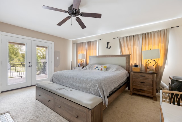 carpeted bedroom featuring access to outside and ceiling fan