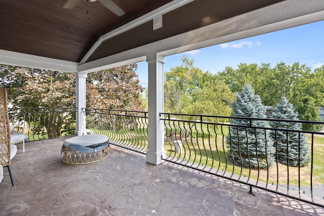 view of patio featuring a balcony