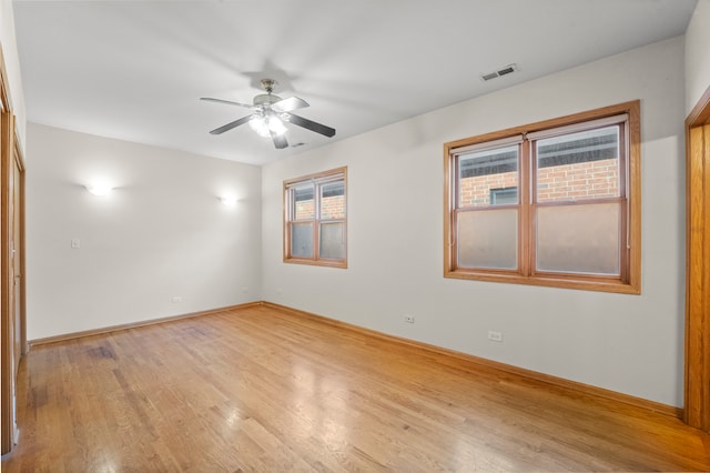 unfurnished room with light hardwood / wood-style floors and ceiling fan