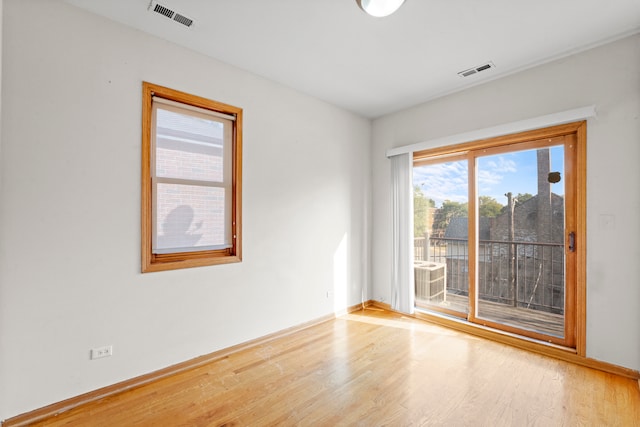 empty room featuring wood-type flooring