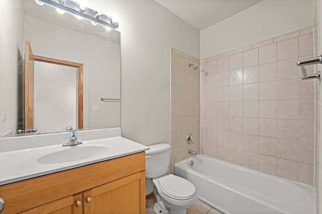 full bathroom featuring vanity, toilet, tile patterned floors, and tiled shower / bath