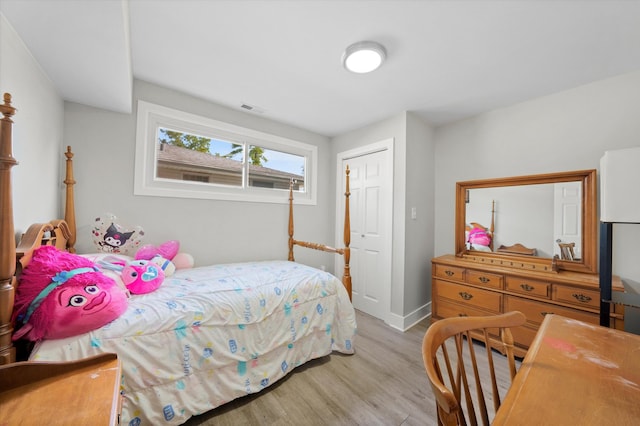 bedroom featuring light wood-type flooring