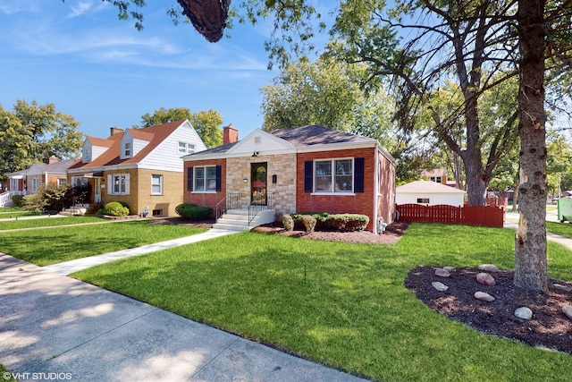 view of front facade with a front yard