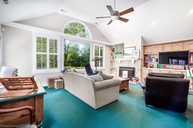 carpeted living room with high vaulted ceiling and ceiling fan