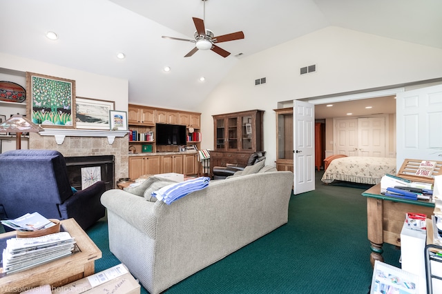 carpeted living room with high vaulted ceiling and ceiling fan