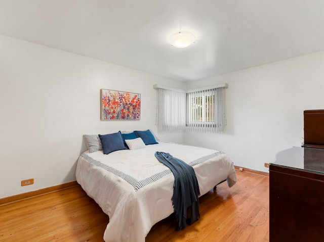 bedroom featuring hardwood / wood-style flooring