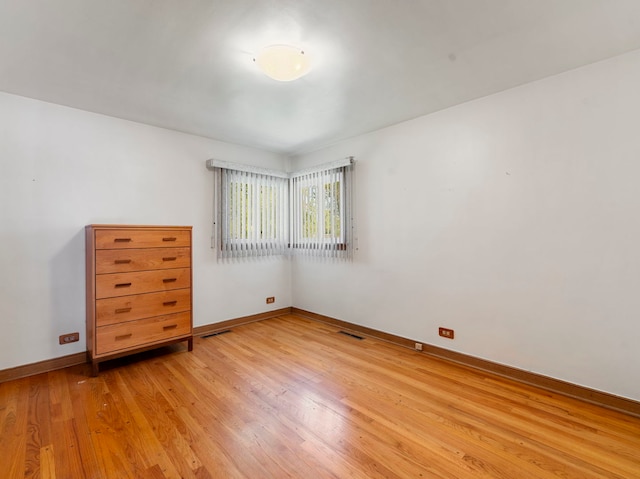 unfurnished bedroom with light hardwood / wood-style floors