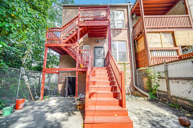 rear view of property featuring a patio