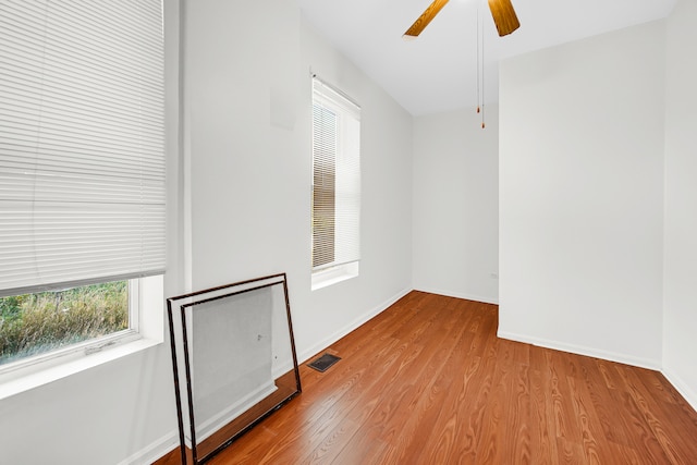 spare room with ceiling fan and light hardwood / wood-style floors