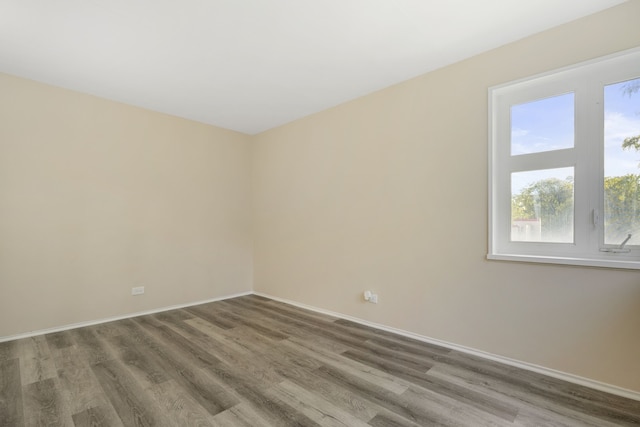 7204 Oak Ave Unit 3Se, River Forest, IL 60305 - spare room featuring wood finished floors and baseboards
