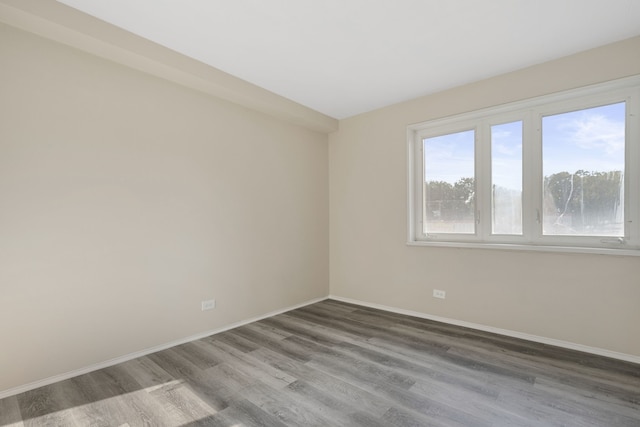 7204 Oak Ave Unit 3Se, River Forest, IL 60305 - spare room featuring wood finished floors and baseboards