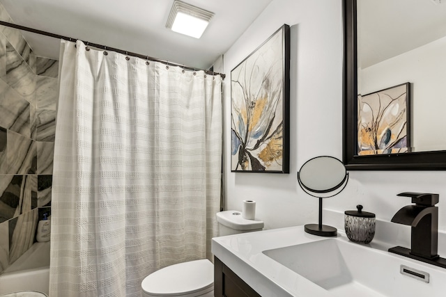 full bathroom featuring shower / bathtub combination with curtain, vanity, and toilet