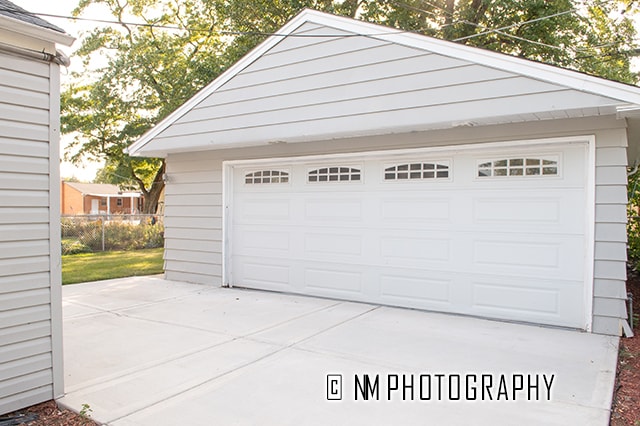 garage with wood walls