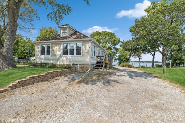 view of front of home with a front lawn