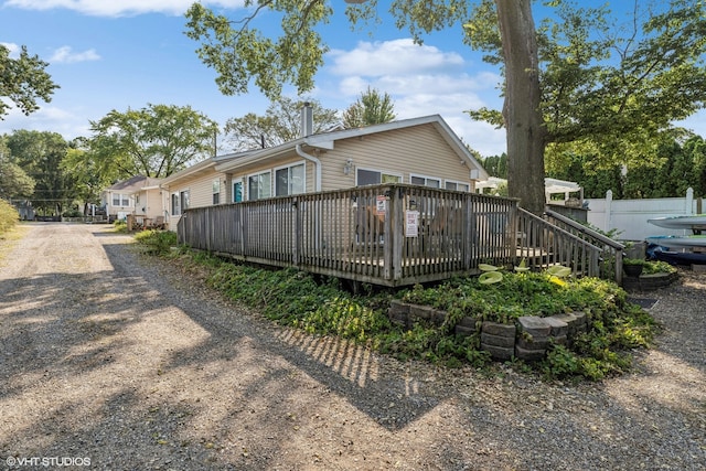 exterior space featuring a wooden deck