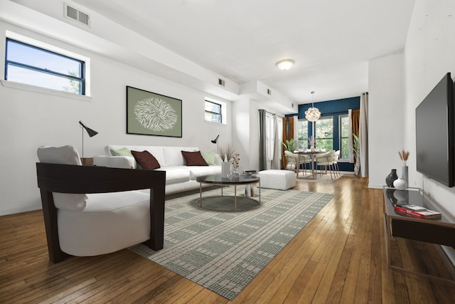 living room featuring dark wood-type flooring