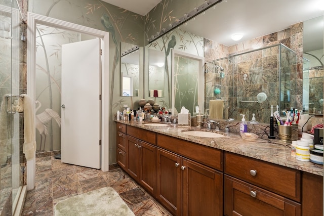 bathroom with vanity and an enclosed shower