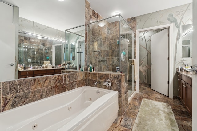 bathroom featuring shower with separate bathtub and vanity