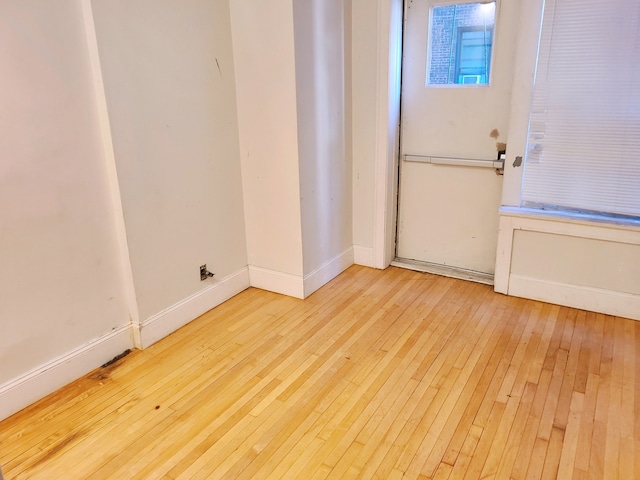 empty room featuring light hardwood / wood-style floors