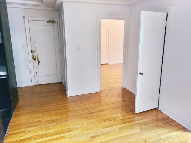 empty room with light wood-type flooring