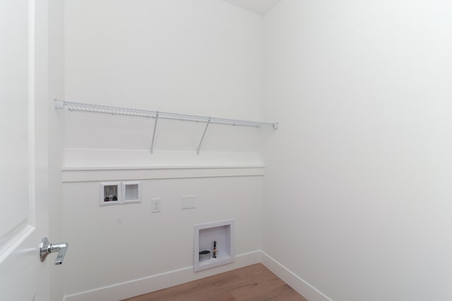 laundry area with washer hookup and wood-type flooring