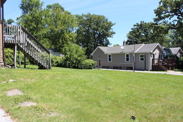 view of yard with a deck