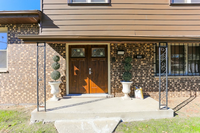 entrance to property with a porch