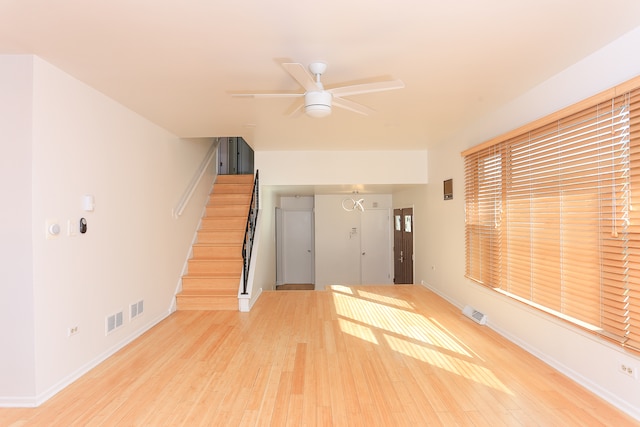 interior space featuring light wood-type flooring and ceiling fan