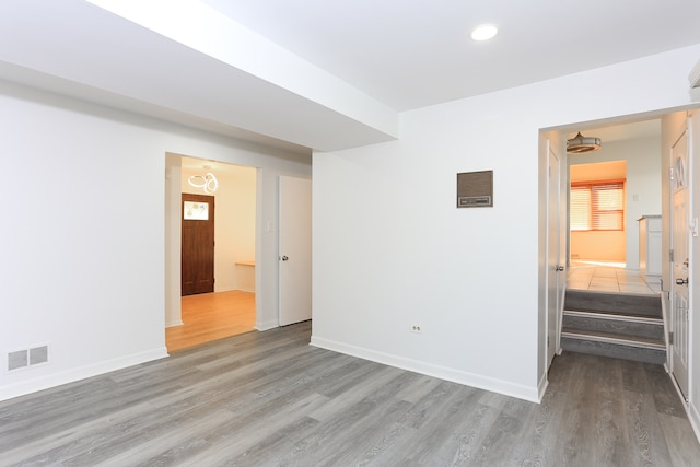 unfurnished room featuring light hardwood / wood-style floors