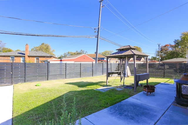 view of yard featuring a gazebo and a patio area