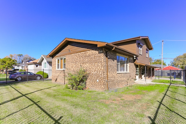 view of home's exterior featuring a yard