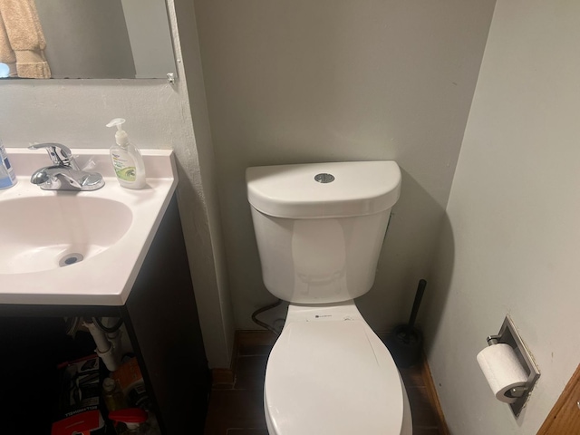 bathroom with vanity and toilet