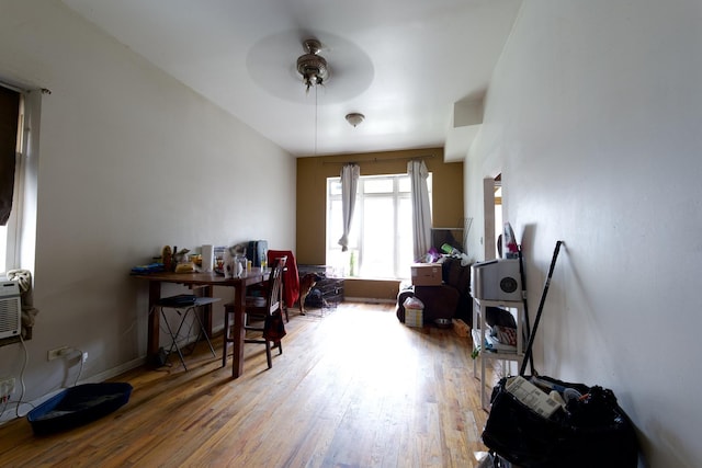 foyer entrance with hardwood / wood-style flooring and ceiling fan