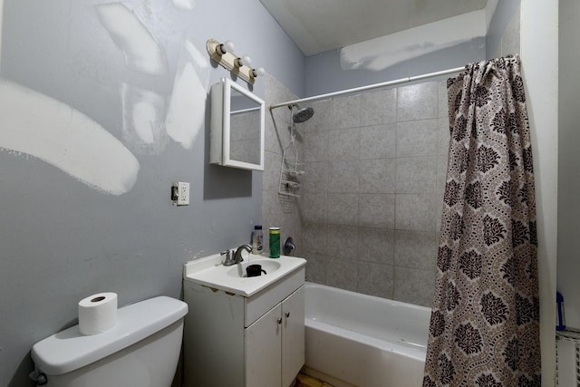 full bathroom with vanity, toilet, and shower / bath combo with shower curtain