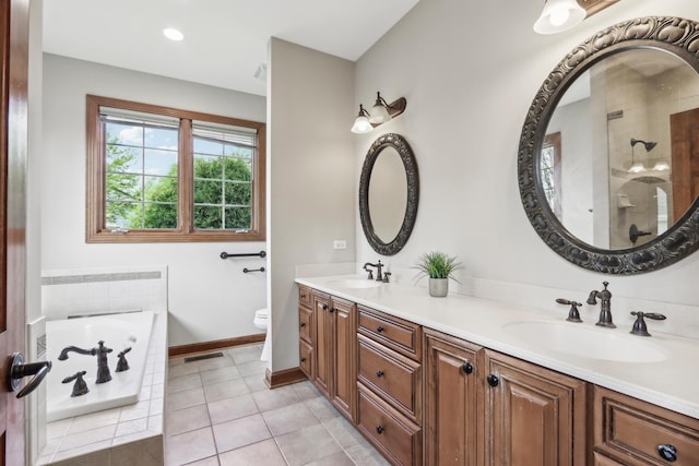 140 E Lynn St, South Elgin, IL 60177 - bathroom with toilet, double vanity, a sink, and baseboards